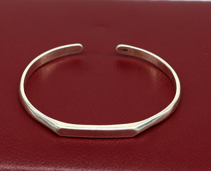 925 sterling silver bangle bracelet by Tribal Ornaments, shiny and adjustable cuff for men or women, ideal for personalized gifting.