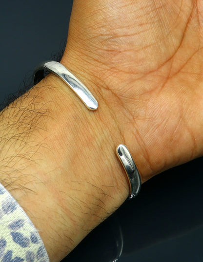 925 sterling silver shiny bangle cuff bracelet by TRIBAL ORNAMENTS, adjustable unisex jewelry with personalized gifting style.