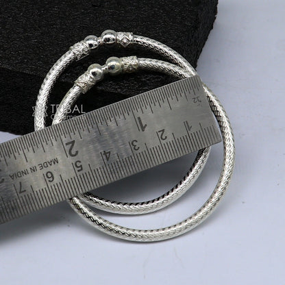 Sterling silver bangle bracelet from TRIBAL ORNAMENTS featuring a shiny, plain design, suitable for men or women, stylish and elegant.