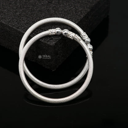 Sterling silver bangle bracelet by Tribal Ornaments, shiny and bright, stylish kada suitable for men or women.