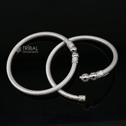 Shiny 925 sterling silver bangle bracelet by TRIBAL ORNAMENTS, stylish and personalized, suitable for men or women.