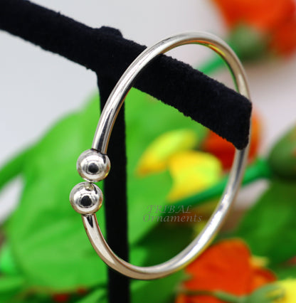 Sterling silver round bangle bracelet with shiny, customized design, stylish belly dance jewelry by TRIBAL ORNAMENTS.