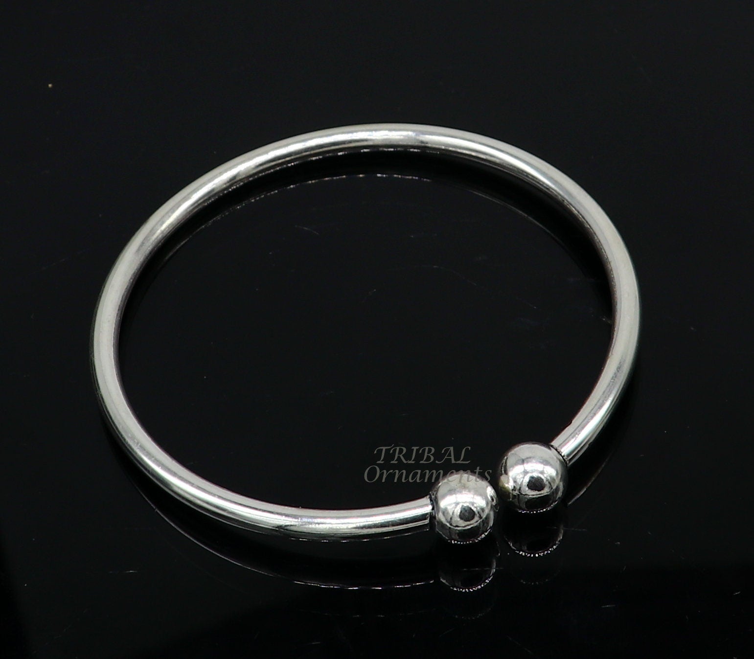 Sterling silver round bangle bracelet with shiny plain design, stylish bridal jewelry, suitable for belly dance or special occasions.