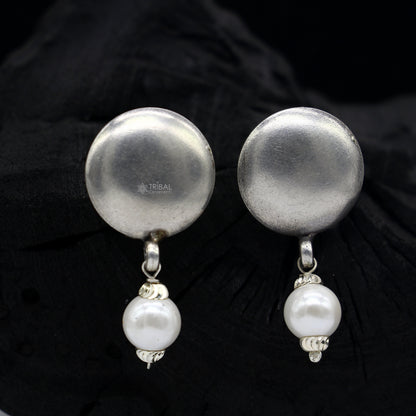 925 sterling silver handmade round stud earrings with tribal design, Rajasthan India, by TRIBAL ORNAMENTS.