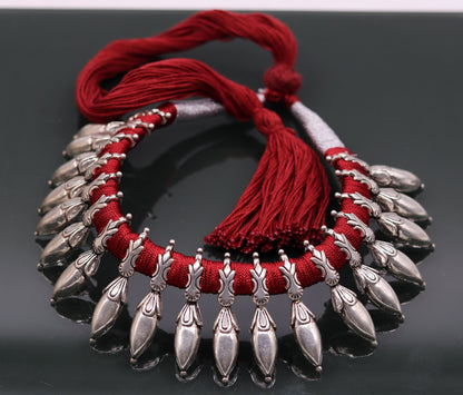 Sterling silver handmade charm necklace and choker by Tribal Ornaments, featuring tribal design, adjustable fit, for belly dance or wedding wear.