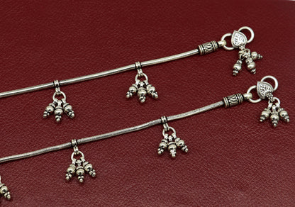 Sterling silver snake chain ankle bracelet with single line layered design, perfect for belly dance and trendy foot jewelry.