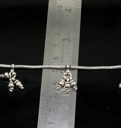Sterling silver snake chain ankle bracelet featuring a single line design, perfect for trendy belly dance or casual foot jewelry.