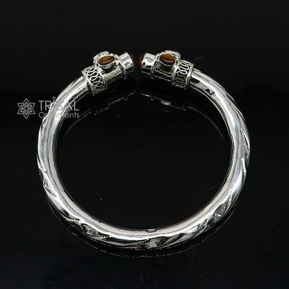 Unisex 925 sterling silver bangle bracelet with tiger eye stone accents, customized jewelry by TRIBAL ORNAMENTS.