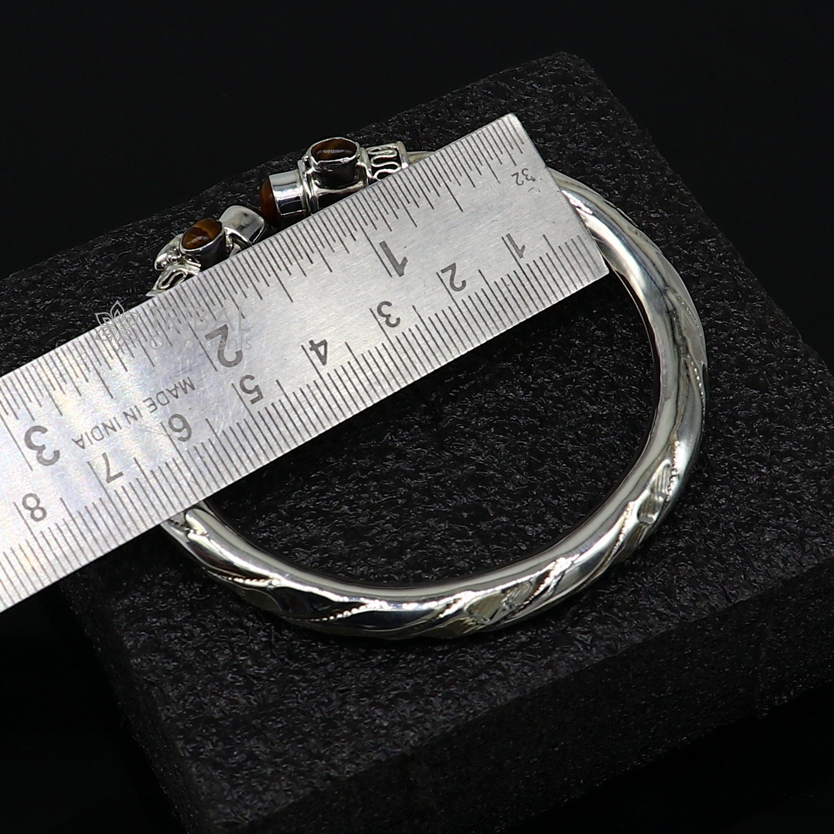 Unisex 925 sterling silver tiger eye stone bangle bracelet with intricate tribal design, customized jewelry by Tribal Ornaments.