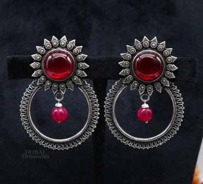 Sterling silver tribal earrings with vibrant red glossy stone, handmade traditional style earrings for ethnic and tribal fashion.