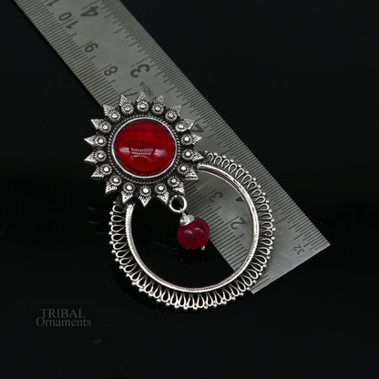 Sterling silver tribal earrings with red glossy stone in traditional handmade design, ethnic style stud earrings.