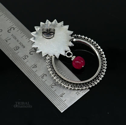 925 sterling silver tribal-style handmade stud earrings with glossy red stones, featuring traditional ethnic design.