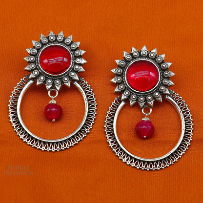 Sterling silver tribal-style stud earrings with vibrant red glossy stones, handmade ethnic jewelry by TRIBAL ORNAMENTS.
