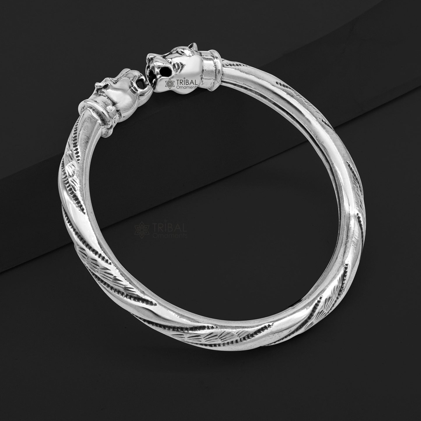 Sterling silver lion face kada bracelet by Tribal Ornaments, featuring tribal-inspired design and attractive tribal jewelry details.
