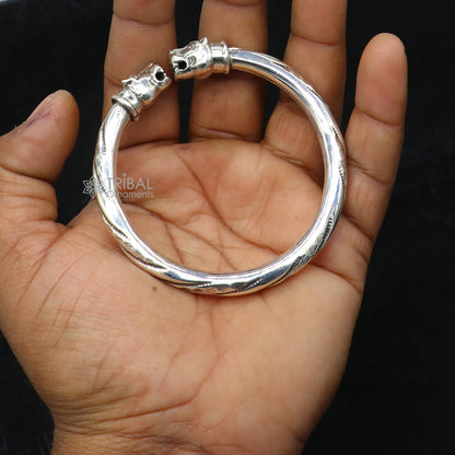 Sterling silver lion face kada bracelet by Tribal Ornaments featuring tribal-inspired design and attractive craftsmanship.