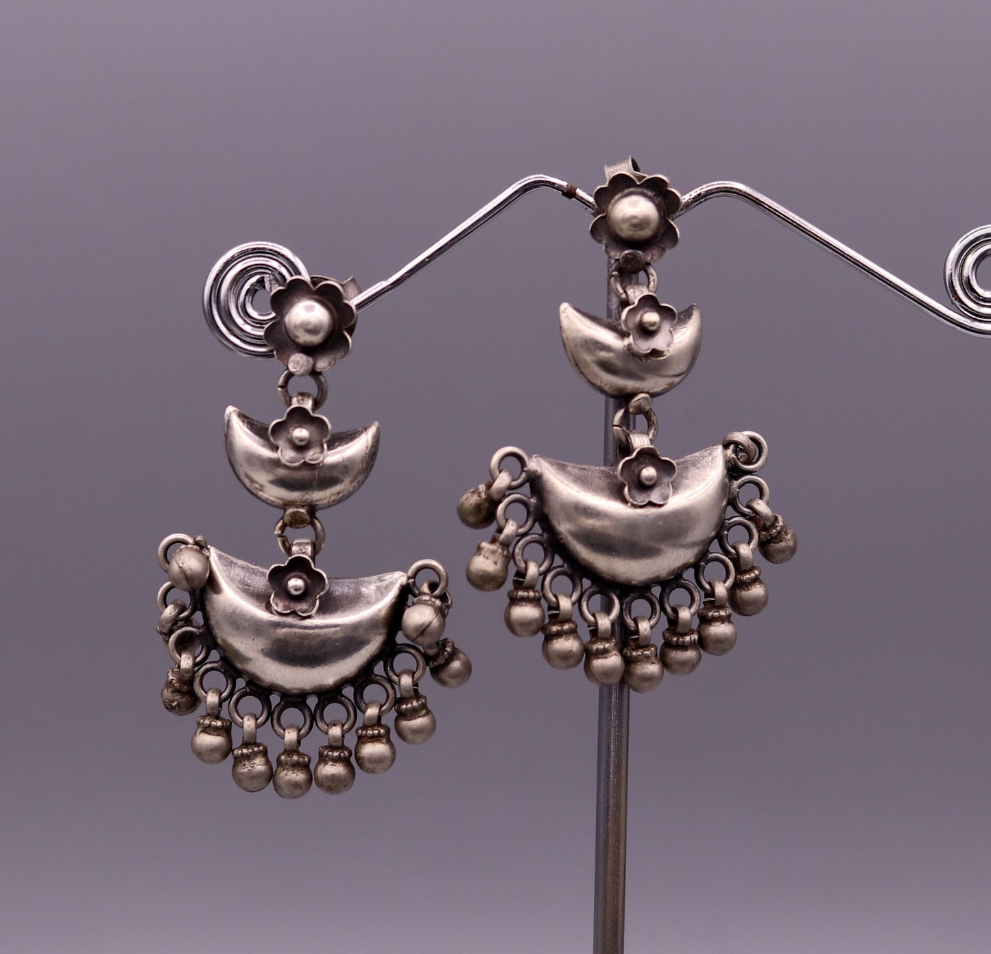 Sterling silver tribal earrings with half moon design, stud earrings with hanging bells, perfect for wedding or party jewelry.