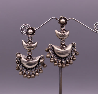 Sterling silver tribal earrings with half moon design, stud earrings with hanging bells, perfect for wedding or party jewelry.