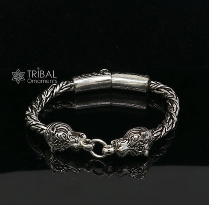 Sterling silver chain bracelet with lion face design by TRIBAL ORNAMENTS, featuring antique style and stylish jewelry details.