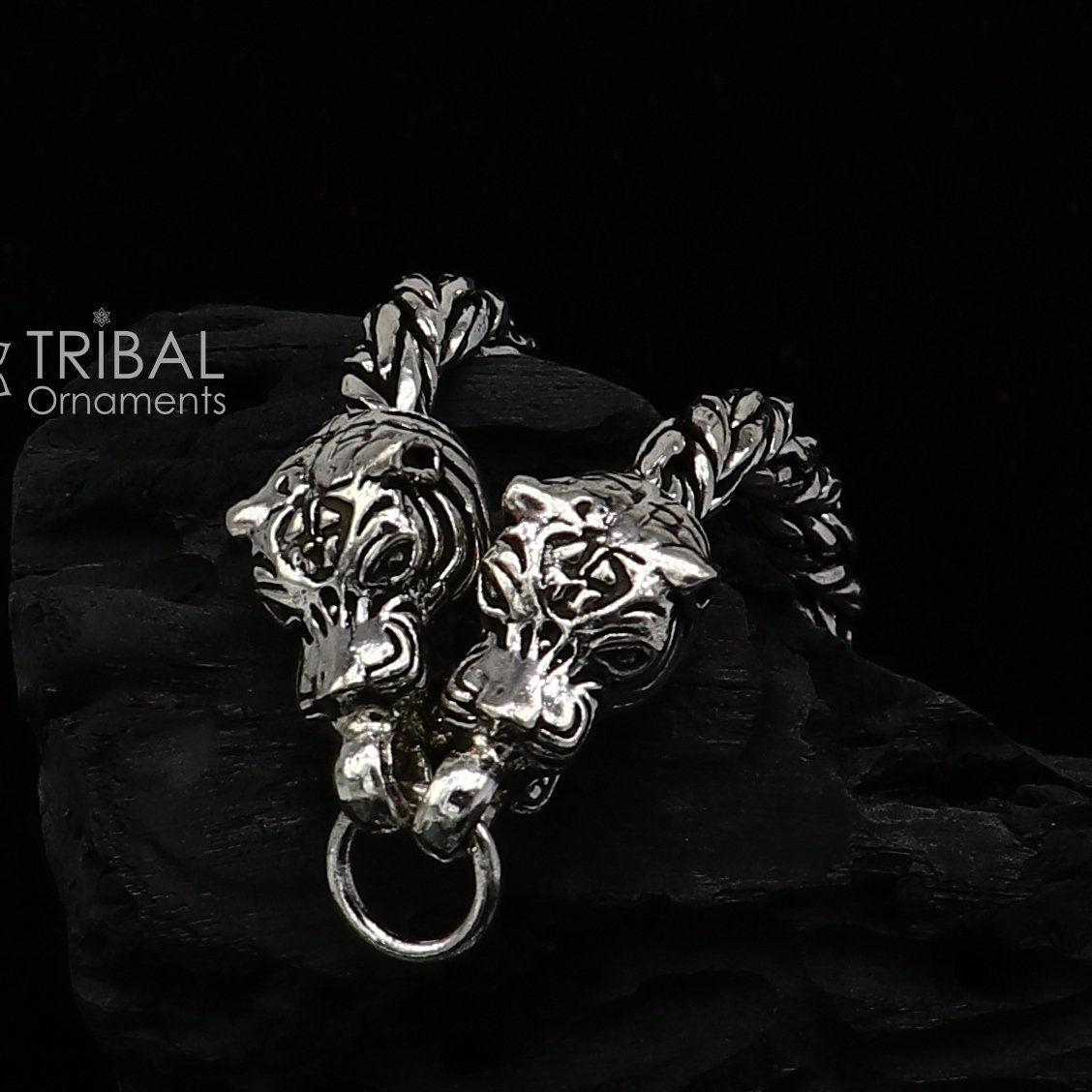 Sterling silver chain bracelet with lion face design by TRIBAL ORNAMENTS, featuring antique style for stylish gifting jewelry.