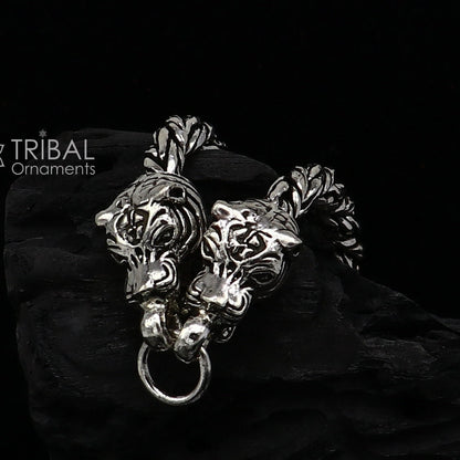 Sterling silver chain bracelet with lion face design by TRIBAL ORNAMENTS, featuring antique style for stylish gifting jewelry.