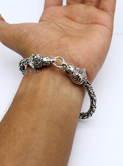 Sterling silver chain bracelet with lion face design by TRIBAL ORNAMENTS, stylish jewelry perfect for gifting or everyday wear.