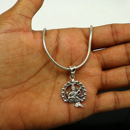 Sterling silver Goddess Saraswati pendant featuring intricate tribal design, personalized jewelry from Tribal Ornaments.