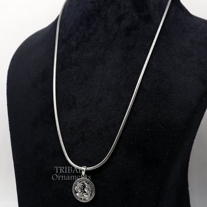 Sterling silver Gemini zodiac pendant featuring Mithun Rashi symbol, tribal-inspired horoscope jewelry by TRIBAL ORNAMENTS.