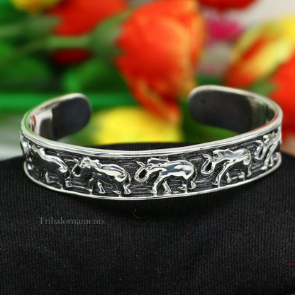 Handcrafted 925 sterling silver elephant cuff bracelet with adjustable tribal design, unisex ethnic jewelry by Tribal Ornaments.