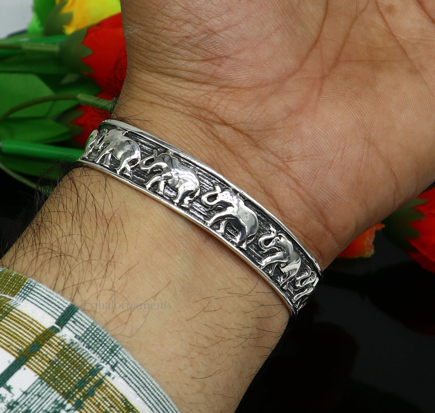 Sterling silver handcrafted elephant cuff bracelet by TRIBAL ORNAMENTS, adjustable tribal jewelry for men and women.