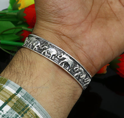 Sterling silver handcrafted elephant cuff bracelet by TRIBAL ORNAMENTS, adjustable tribal jewelry for men and women.