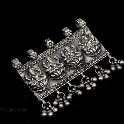 Sterling silver vintage Indian Goddess Laxmi pendant with intricate design and decorative drops, tribal belly dance jewelry.