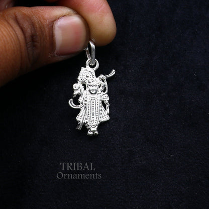 Sterling silver Krishna Shrinath Ji pendant featuring intricate traditional design, crafted by TRIBAL ORNAMENTS.