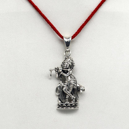 925 sterling silver Krishna with cow pendant, vintage Hindu idol jewelry by TRIBAL ORNAMENTS, featuring intricate design.