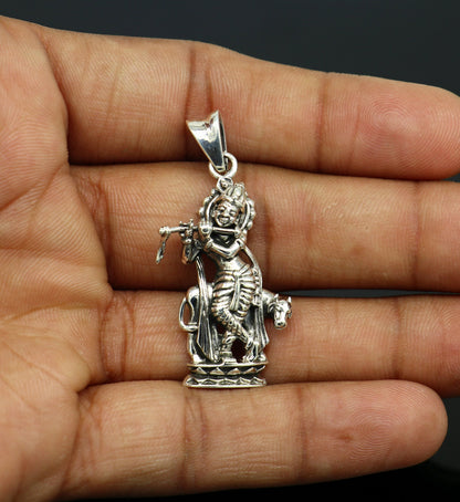 Sterling silver Krishna with cow pendant, intricate Hindu idol jewelry, vintage tribal design, perfect for gifting by TRIBAL ORNAMENTS.