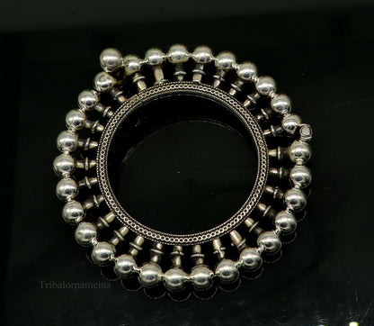 Sterling silver vintage tribal bangle bracelet with ethnic design, inspired by Banjara and belly dance jewelry styles.