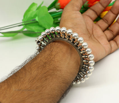 Sterling silver vintage tribal bangle bracelet with ethnic design and antique detailing, suitable for Banjara belly dance jewelry.