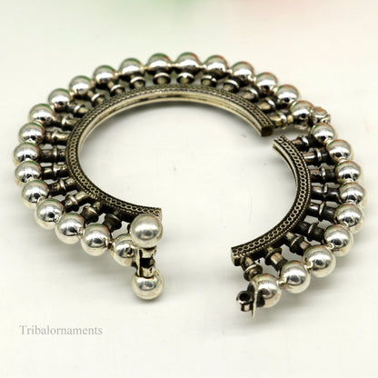 Sterling silver vintage ethnic bangle bracelet with tribal design, featuring intricate patterns and traditional Banjara jewelry details.