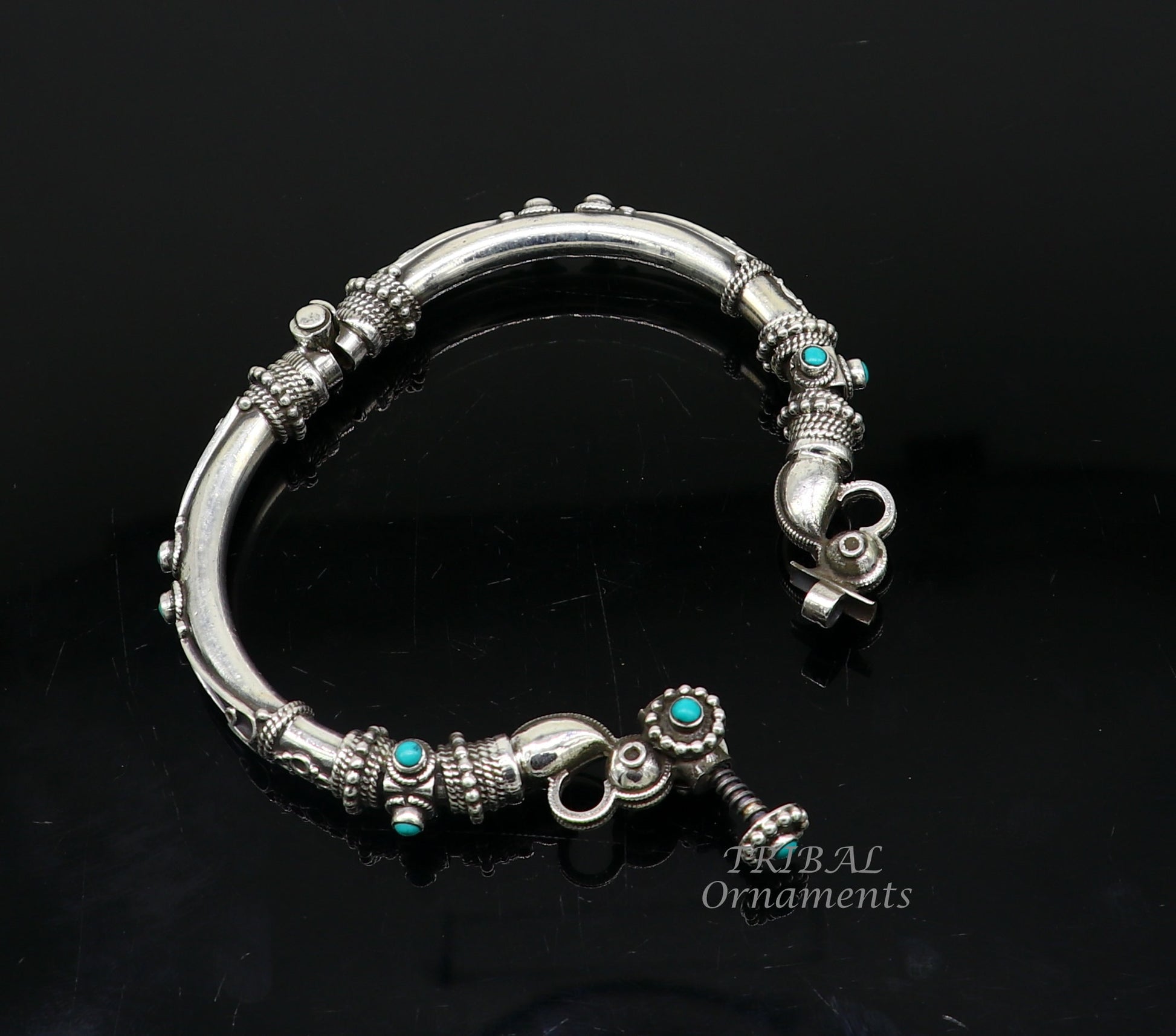 Sterling silver vintage peacock design bangle with turquoise stone, tribal ethnic jewelry by TRIBAL ORNAMENTS.