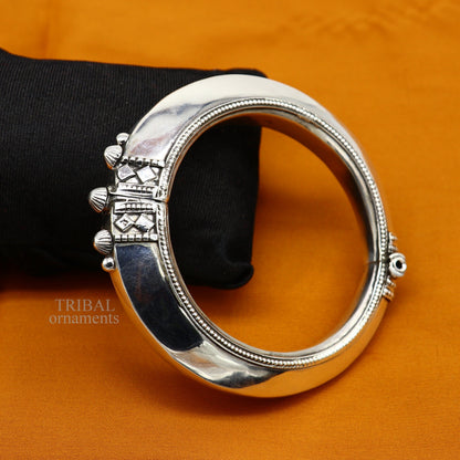 Sterling silver vintage open face cuff bracelet by TRIBAL ORNAMENTS, unisex ethnic jewelry with plain design and adjustable fit.