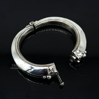 Sterling silver vintage open face cuff bracelet by TRIBAL ORNAMENTS, unisex ethnic jewelry with plain design and adjustable fit.