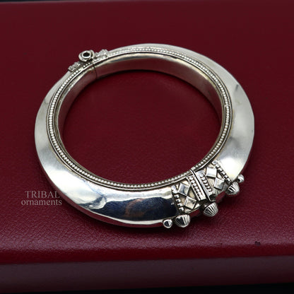 Sterling silver vintage open face cuff bracelet by TRIBAL ORNAMENTS, unisex ethnic jewelry with plain design and adjustable fit.
