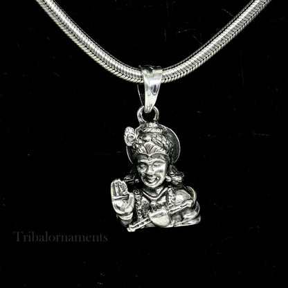 Sterling silver vintage Divine Krishna pendant by TRIBAL ORNAMENTS, detailed Hindu idol jewelry for gifting and special occasions.