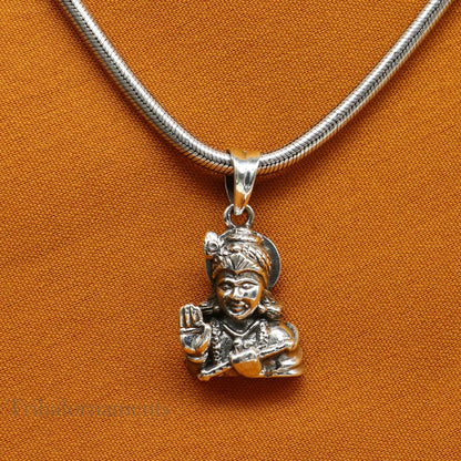 Sterling silver vintage Divine Krishna pendant jewelry by TRIBAL ORNAMENTS, featuring a detailed Hindu idol design.