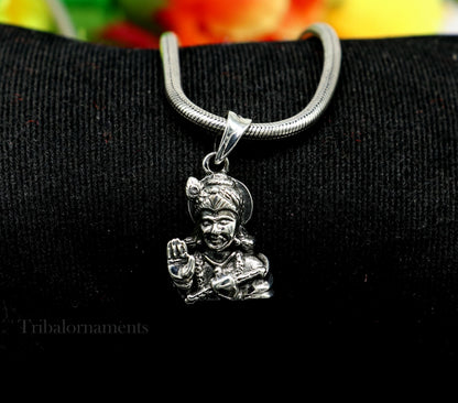 Sterling silver Divine Krishna pendant from Tribal Ornaments, vintage Hindu jewelry featuring intricate design and divine symbolism.