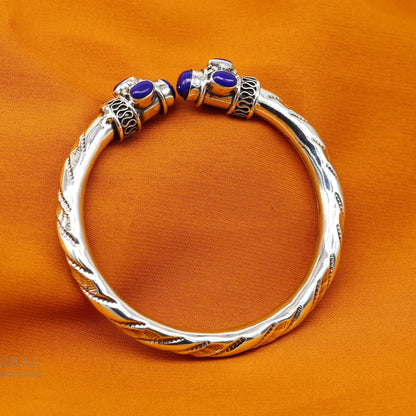 Sterling silver vintage-style stone jadau bangle bracelet with intricate traditional design, unisex jewelry from Tribal Ornaments.
