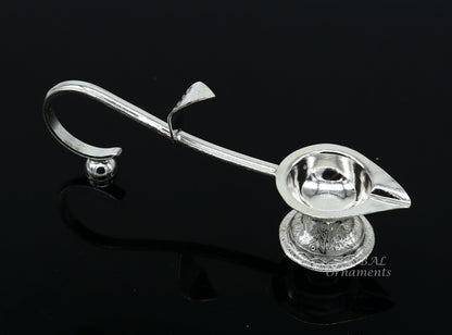 Vintage solid silver Kapoor Deepak with intricate design, handmade temple diya and utensils for Aarti ceremonies.