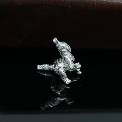 Sterling silver Little Krishna idol sculpture for home temple puja, detailed Indian deity art and decorative utensil from Tribal Ornaments.