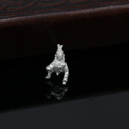 Sterling silver small Krishna idol sculpture, Ladu Gopal, for home temple puja, customized Indian deity art by TRIBAL ORNAMENTS