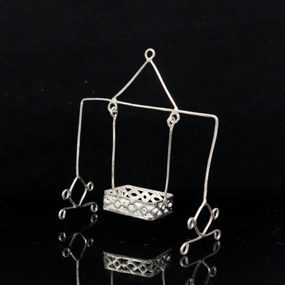 Handmade lightweight 925 sterling silver Bal Gopala Krishna swing for children, featuring intricate tribal ornament design.