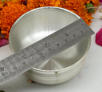 Handmade 99.9% pure sterling silver bowl with a polished finish, showcasing its solid silver craftsmanship and traditional design.